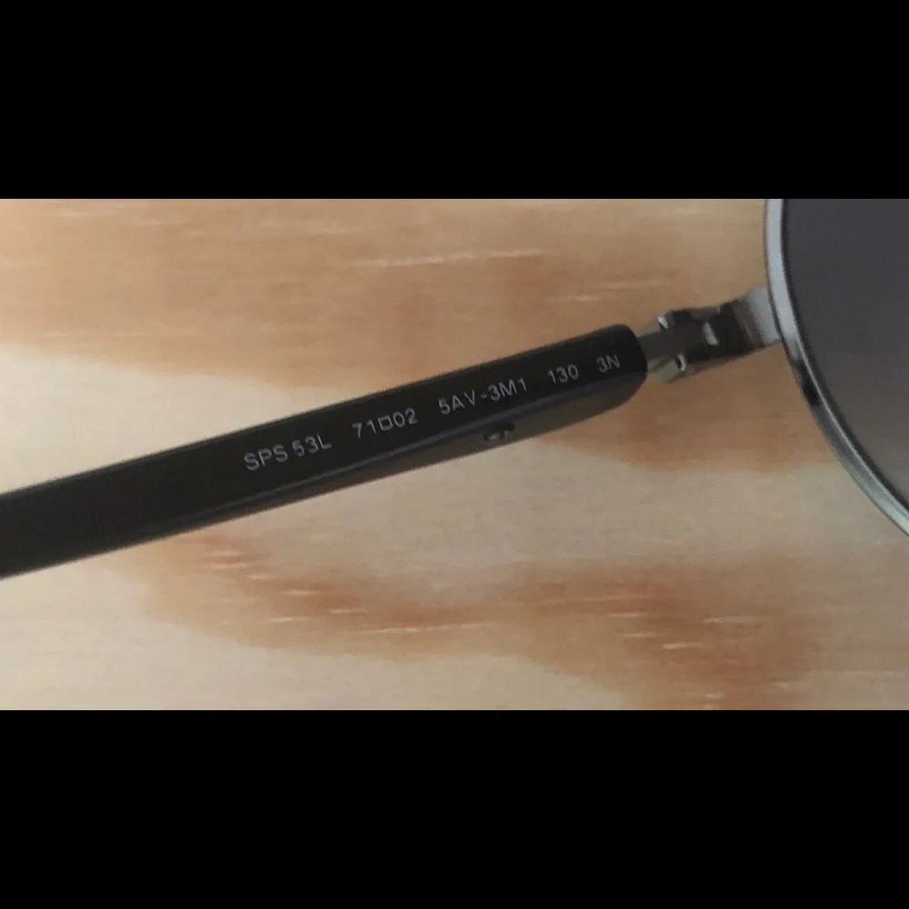 Prada Sunglasses.